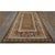 Antique Allover Floral Wool Hand Knotted Pile Brown Earth Tone 1750s Rug, Circa Date: 1750s. This extraordinary piece...
