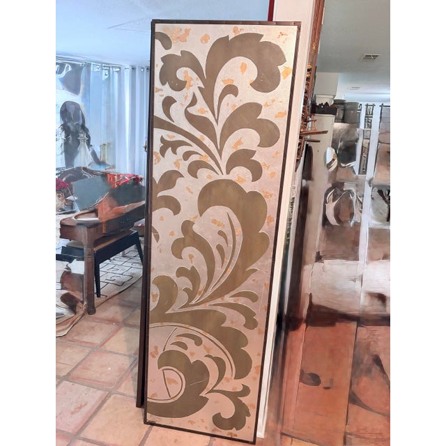 Vintage foil wall panels (pair) With hanger on backside Silver with gold accents and a green/black design Trimmed in a...