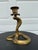 Antique late 20th century gilt iron cobra candlestick. Beautiful brass color over cast iron.