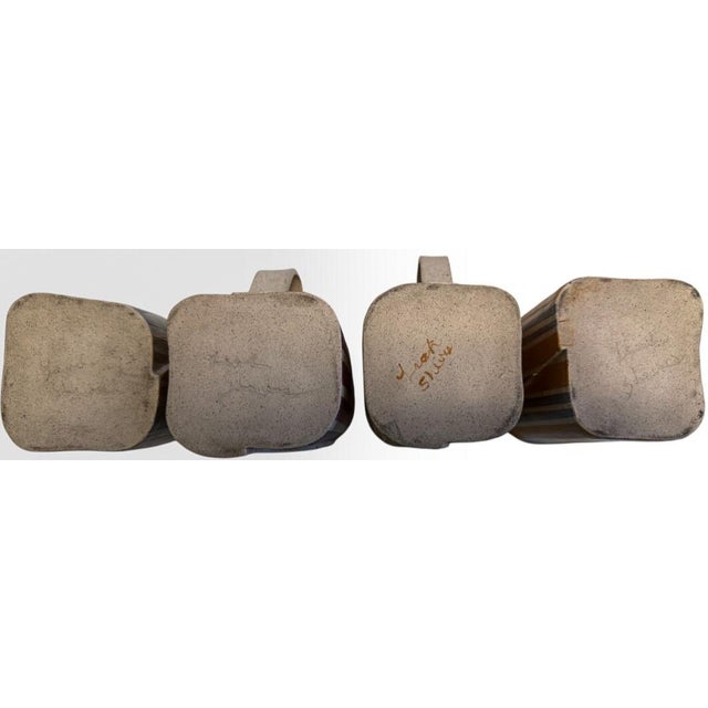 Signed Postmodern Hand-Built Studio Art Pottery Striped Stoneware Mugs by Leah Sheves Set of Four A striking celebration...