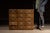Heavy-duty oak storage cabinet constructed with an array of open-through cubbies, originally intended for shop, factory,...