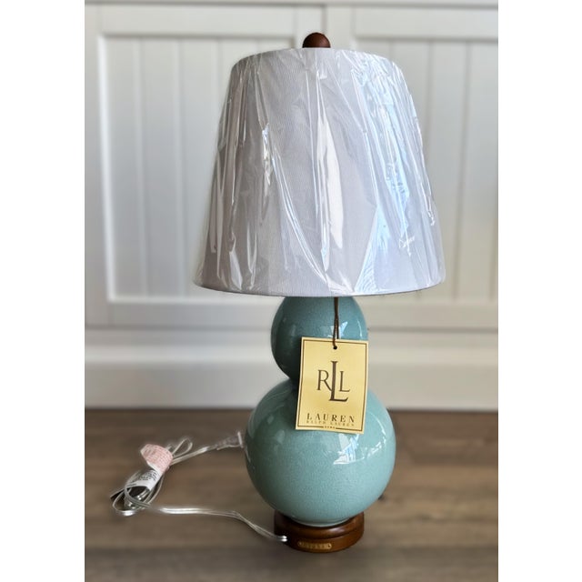 Ralph Lauren Double Gourd Ceramic Table Lamp in crackled celadon green. This traditional style lamp features a warm green...
