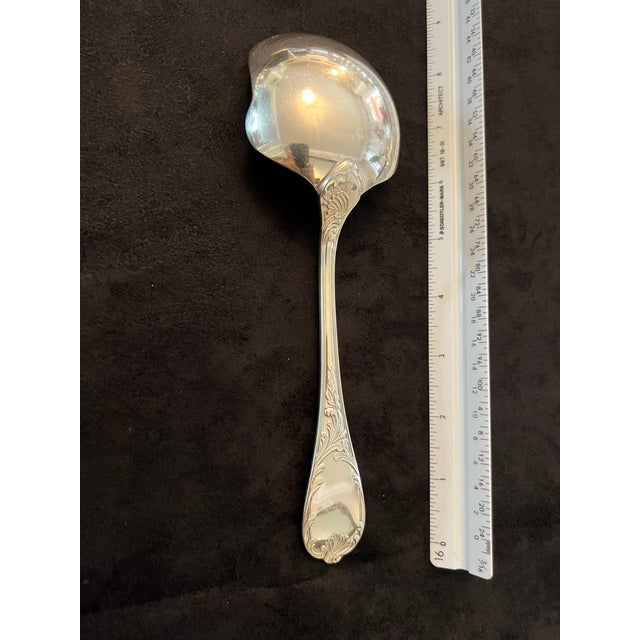 Item is discontinued. Silver plated vegetable or potato serving spoon. Marly, named after a no-longer-standing pleasure...