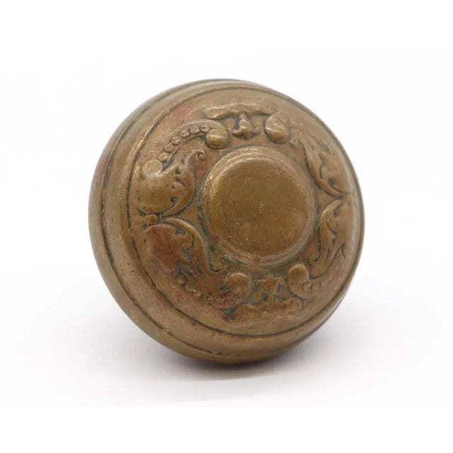 This antique Flemish style two fold door knob made by Corbin in the 1905 catalog. It is part of the F-22400 Holland group....