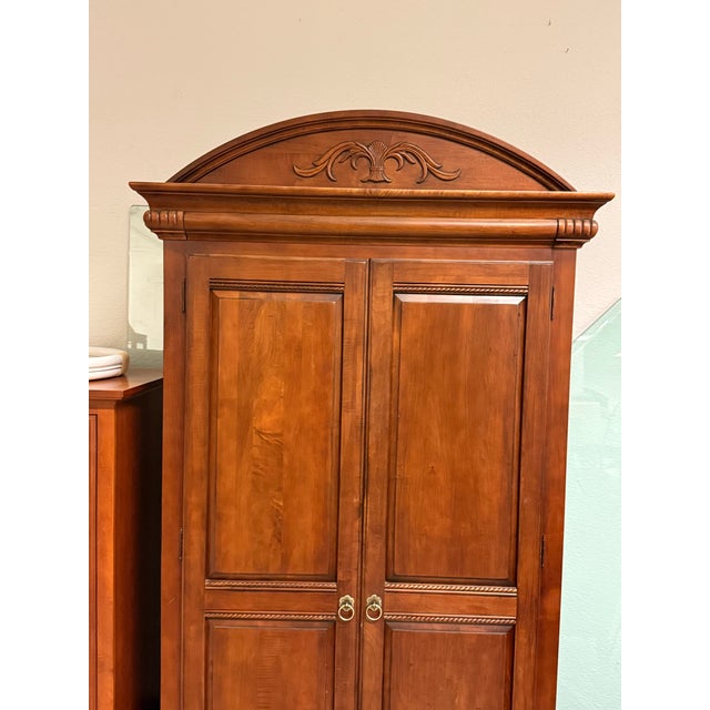 Design Plus Gallery presents the British Classics Collection Armoire from Ethan Allen. This traditional cabinet showcases...