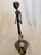 Whimsical vintage mixed-metal sculpture by American artist Sonny Dalton (1933–2011), depicting a runner in motion wearing...