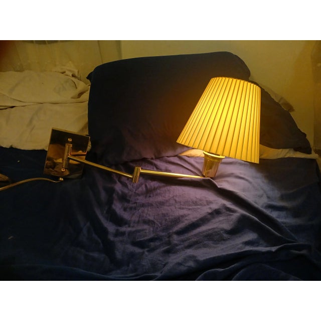 Brass swing arm wall mount with custom made shade and touch sensor switch which also features the dimable technology shade...