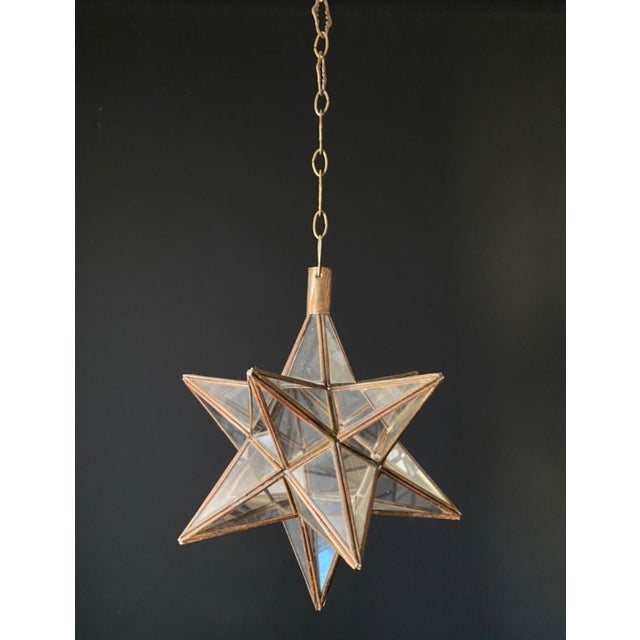 A magnificent antique light star. italy, 20th century. the fixture’s frame is made of iron and glass. A very delicate and...