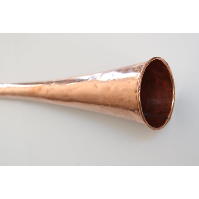 One-of-a kind European Grand Scale trumpet with a attached gold carrying chain. Measures nearly 4' in length, made of...