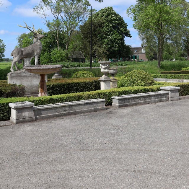 Set of four limestone elements, designed as a modular terrace border in the tradition of French garden architecture....