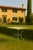 Italian Alnilam Outdoor Table with Travertine Top and Hand-Bent Metal Base For Sale - Image 4 of 5