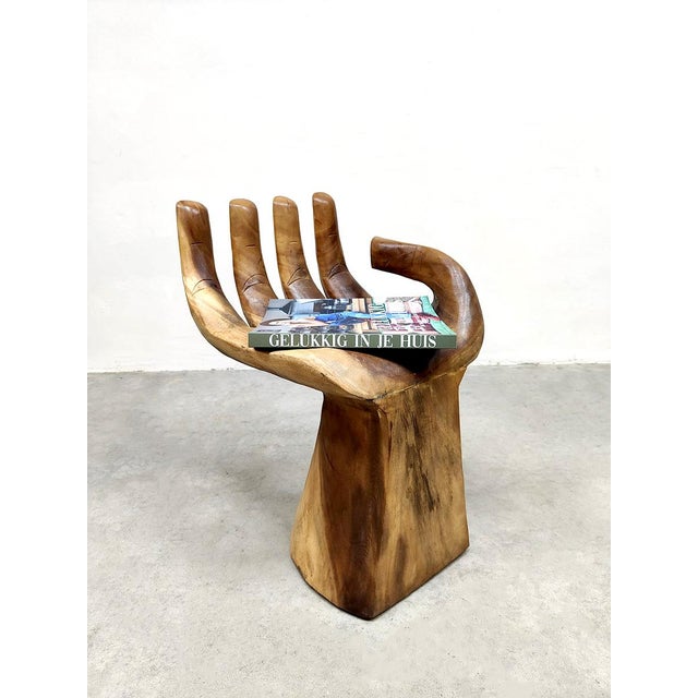 Worn on hands! This unique handcrafted wooden chair in the shape of a hand is a unique item. Inspired by the hand chair by...