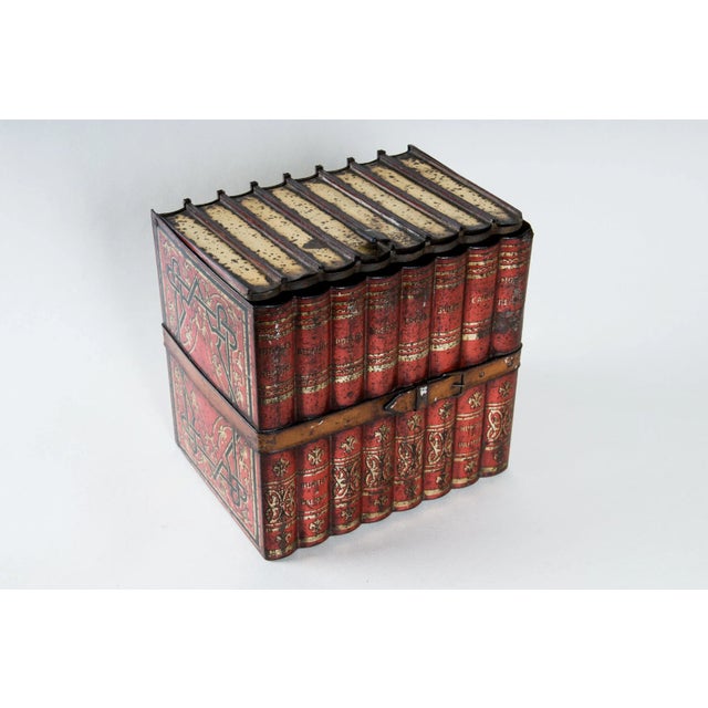 Huntley & Palmers English Biscuit Tin Box. Shaped as eight books with strap Early 20th Century. The English are great...