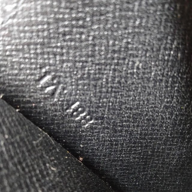 Contemporary A 1993 Louis Vuitton Jena Black Epi Leather Clutch in Excellent Condition For Sale - Image 3 of 18