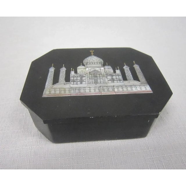 A beautifully hand crafted jewelry vanity dresser trinket box. It is made from a hard Italian stone known as Pietra Dura...