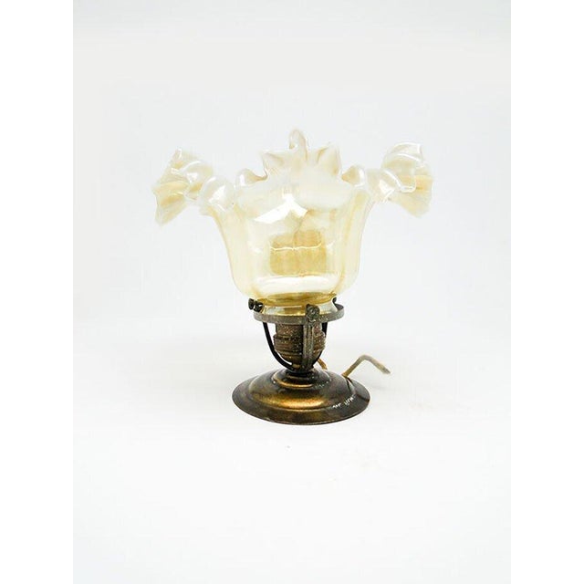 The pendant lamp was produced at the beginning of the twentieth century. It is made in the Art Nouveau style. The...