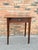This sweet side table features a storage drawer with a lovely brass knob. The finish has a rich character, lovely patina...