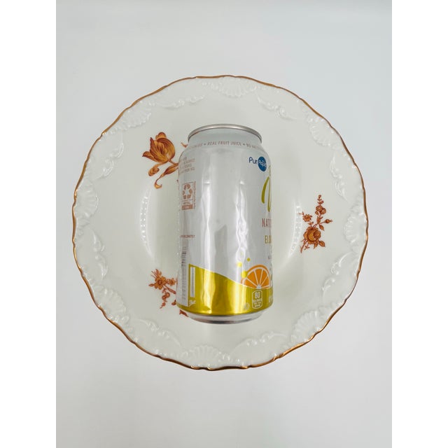 This is a beautiful vintage Limoges Porcelain cake stand. The cake plate or dessert stand is decorated with gilt floral...