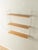 Original String shelving unit designed in 1949 by Nils Strinning in ash veneer. The system consists of two white metal...