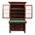 An antique American Empire secretary desk, attributed to Quervelle, crafted from flame mahogany and dating to...