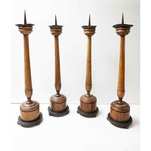 Set of 4 large antique French 19th century wooden candlesticks. This set of candlesticks are early 19th century and...