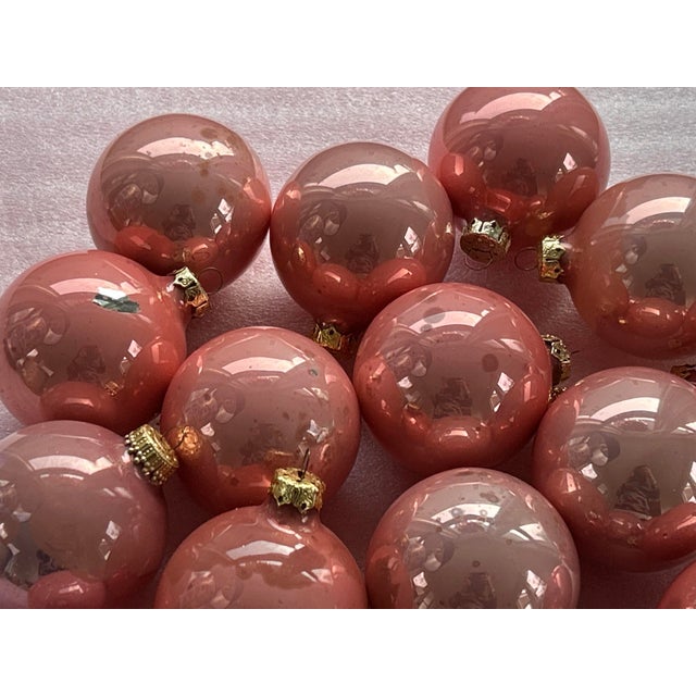 Vintage set of 18 dusty rose glass ball ornaments. Definitely a unique addition to any holiday decor. Very good vintage...