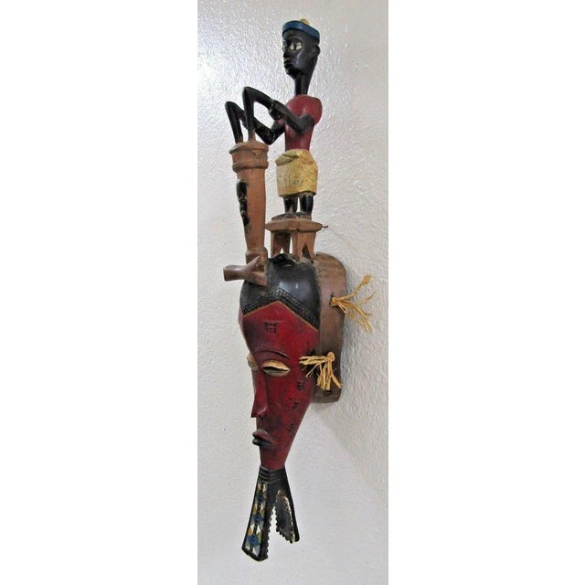 African Antique Hand-Carved Guro Mask of the Ivory Coast Featuring a Seated Figure For Sale - Image 3 of 15