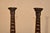 Pair of late 19th century turned oak candlesticks from England. The candle cups are made from hand turned brass, sitting...