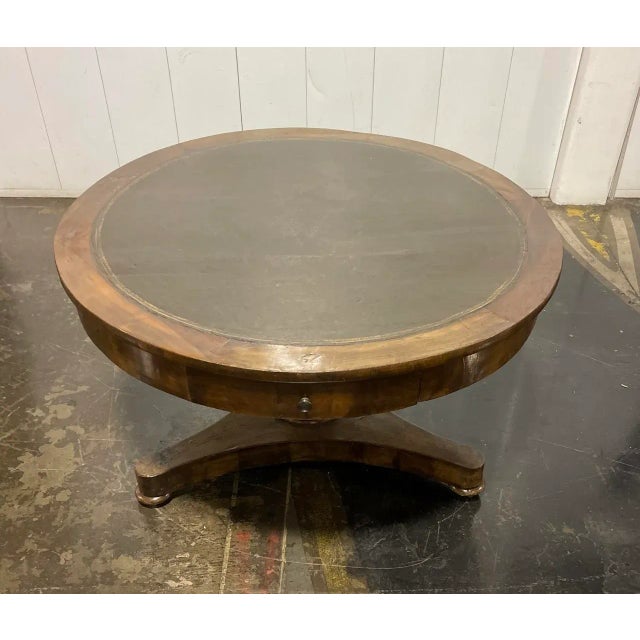 Mid 19th Century antique mahogany English rent table with two drawers and leather top with embossed gilded edge on...