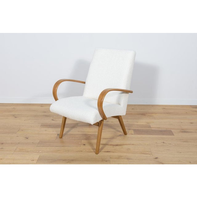 Model 53 armchair was manufactured by Ton in the 1950s to 1960s. They were designed by Jaroslav Smidek. The upholstery...