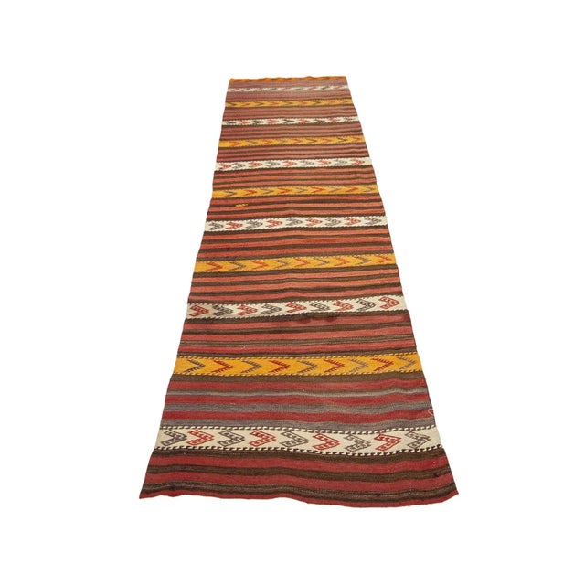Vintage handwoven decorative kilim runner from Denizli region of Turkey. Approximately 45-55 years old. In very good...