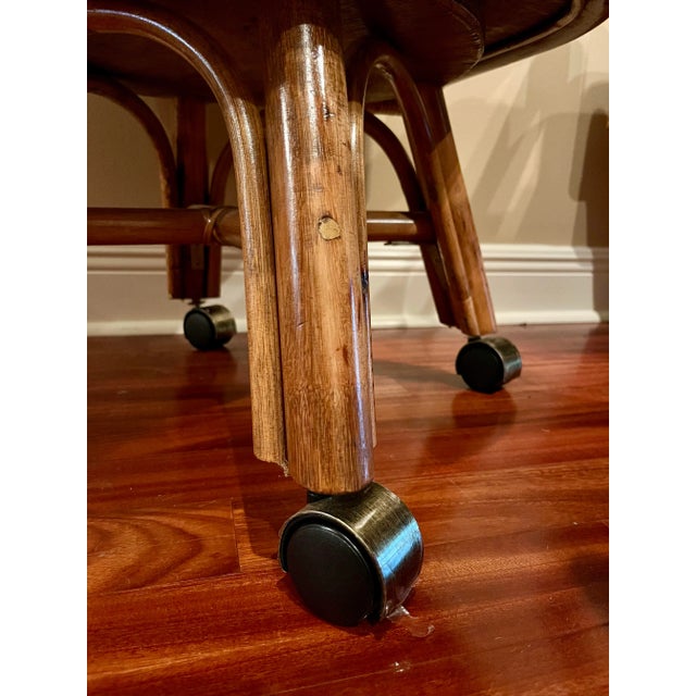 1980’s Rattan Barrel Back Rolling Swivel Dining Chairs - Set of 6 For Sale - Image 4 of 4