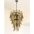 Contemporary gold “RONDINI”Chandelier “Rondini” elements in Murano glass poured over a mold from a traditional Murano...