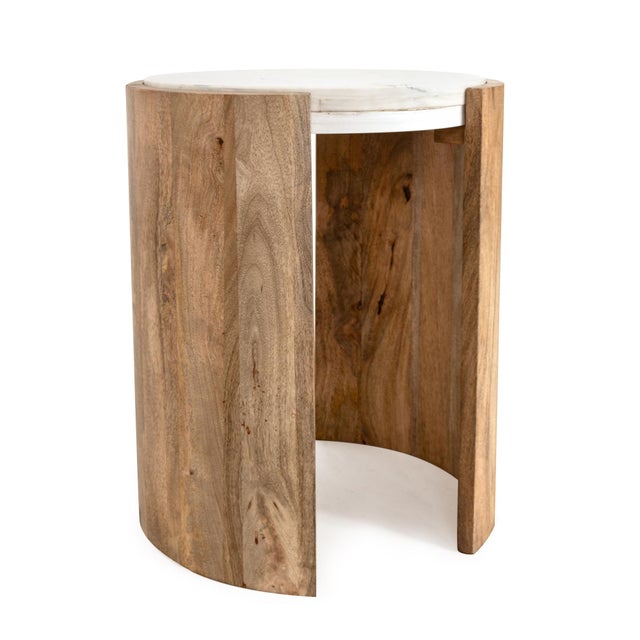 Featuring a smooth round white marble top and warm, curved wood legs, this drink table strikes the perfect balance between...