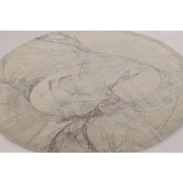 Hand-knotted in a sophisticated blend of wool and silk, this 8’ circle rug from Rug & Kilim’s Modern collection features...