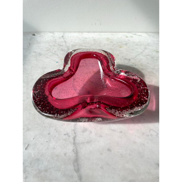 Add a splash of colorful vintage charm to your space with this Mid Century Ruby Red Bubble Barbini Murano Glass Ashtray....