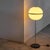 Globe Floor Lamp in Metal and Acrylic 1960s Very stylish floor lamp with acrylic and chrome globe shade. Beautifully made...
