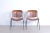 Set consisting of two chairs vintage '60s design 70s, iron structure with legs covered in plastic. Seat and back with...