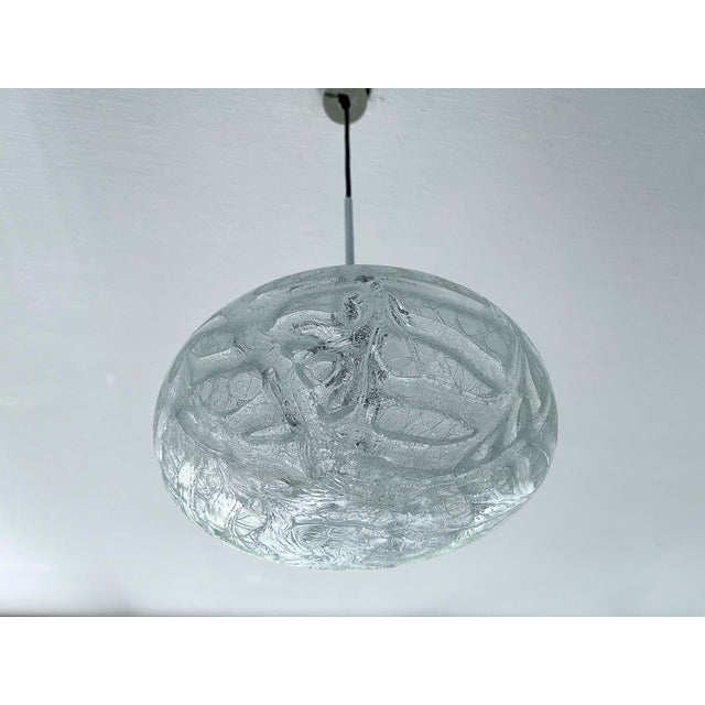 Vintage Mid Century Doria Murano Glass pendant light featuring a cocoon globe shade with irregular glass patches, brushed...