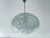 Vintage Mid Century Doria Murano Glass pendant light featuring a cocoon globe shade with irregular glass patches, brushed...
