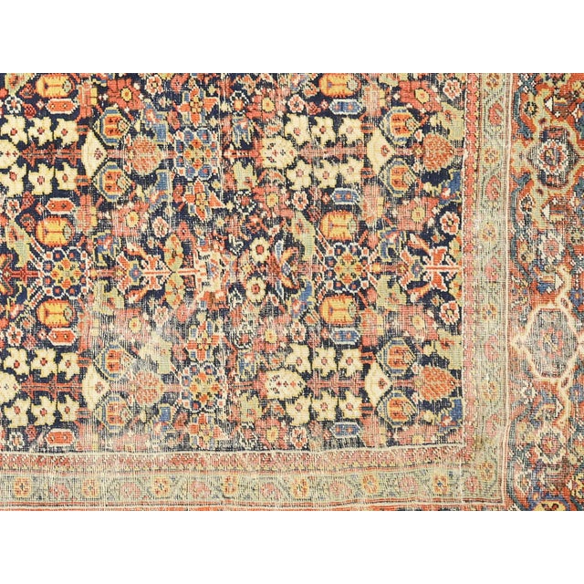 The Semi Antique Persian Mahal Rug, handwoven in Iran's Mahal region, has been distressed and refinished in the USA. This...