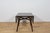The table is equipped with a distinctive butterfly-leaf mechanism featuring two drop leaves, allowing it to function both...