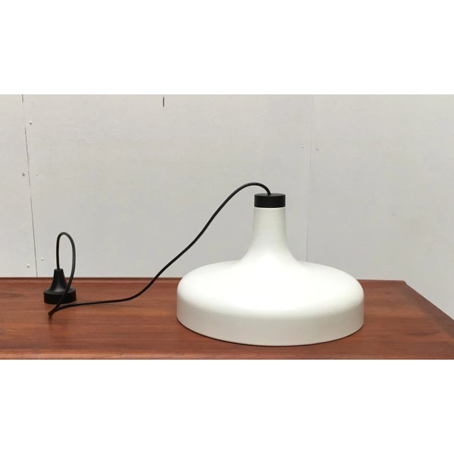 Sleek pendant lamps from the well-known manufacturer Staff Leuchten, Germany. The shade is tulip-shaped. In the upper...