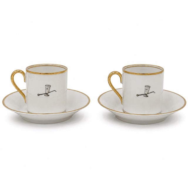 Details: -Pair of vintage porcelain demitasse cups and saucers by Hertel Jacob of Bavaria, Germany. -Each cup features a...