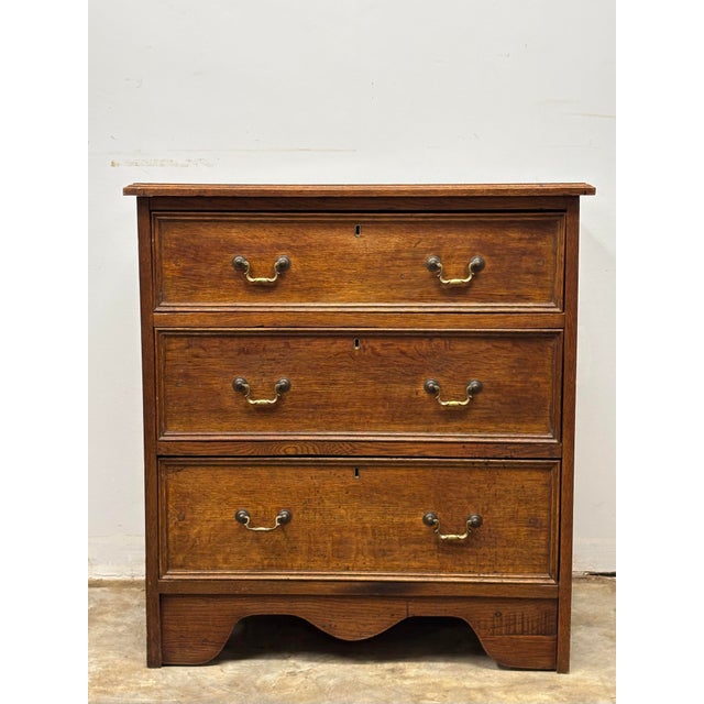 Some pieces earn their place in a home not through grandeur, but through quiet, enduring usefulness. This 19th century...