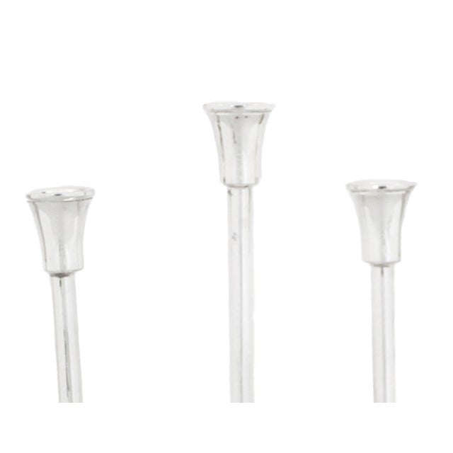 Being offered is a new sterling silver menorah with an unusual design; a modern take on an ancient concept. Unlike the...