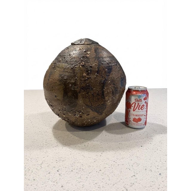 A sizable textured stoneware weedpot by noted American potter William Wyman, c. 1963. Excellent vintage condition with no...