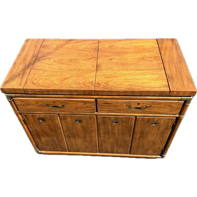 A beautifully crafted Drexel Heritage Accolade II expandable buffet server, thoughtfully designed for both entertaining...