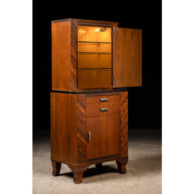 c. 1930s; Hamilton Manufacturing Co. - Two Rivers, WI Elegant walnut medical and dental cabinet manufactured by Hamilton,...