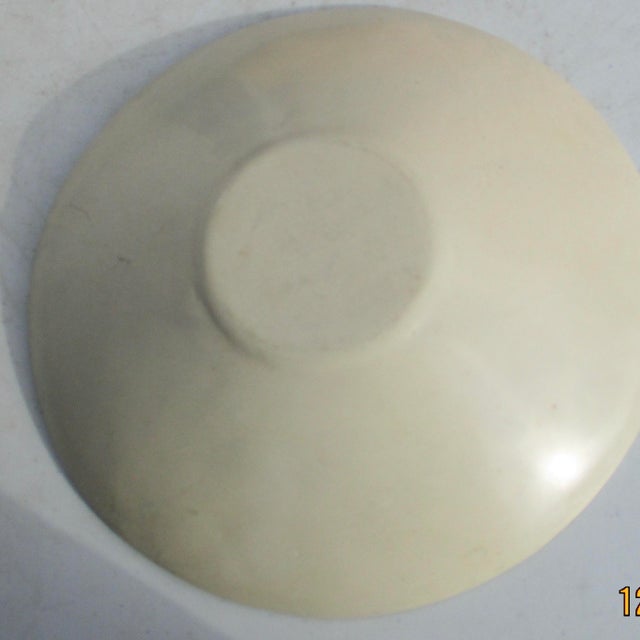 Hand-drawn sketches of jazz dancers reduced to almost musical note bodies. All moving around the bowl with various drums,...